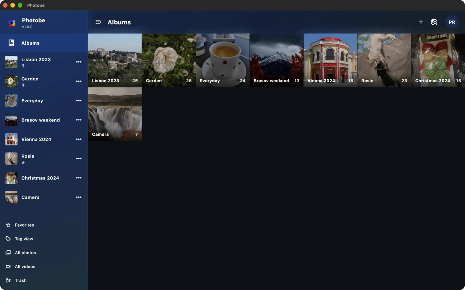 Photobe on macOS: the albums overview with the sidebar.