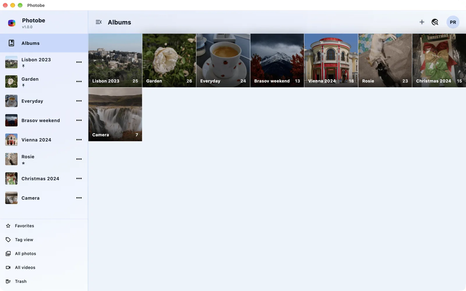 Photobe on macOS: the albums overview with the sidebar.